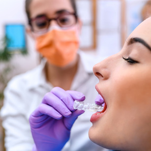 dentist applying a night guard