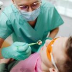 emergency dentist seeing a patient